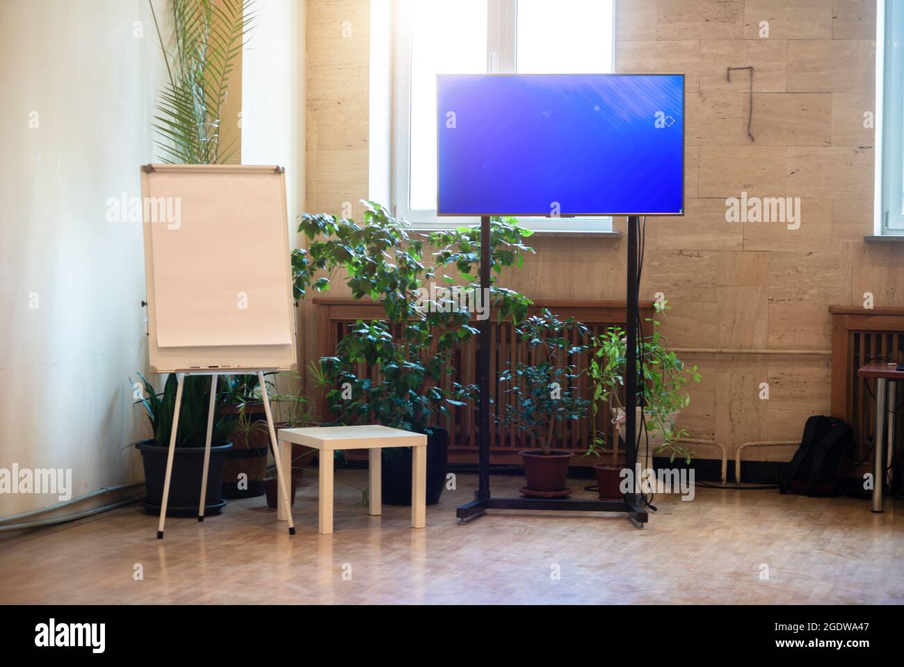 Whiteboard for business presentations and a large flat TV. Stock Photo