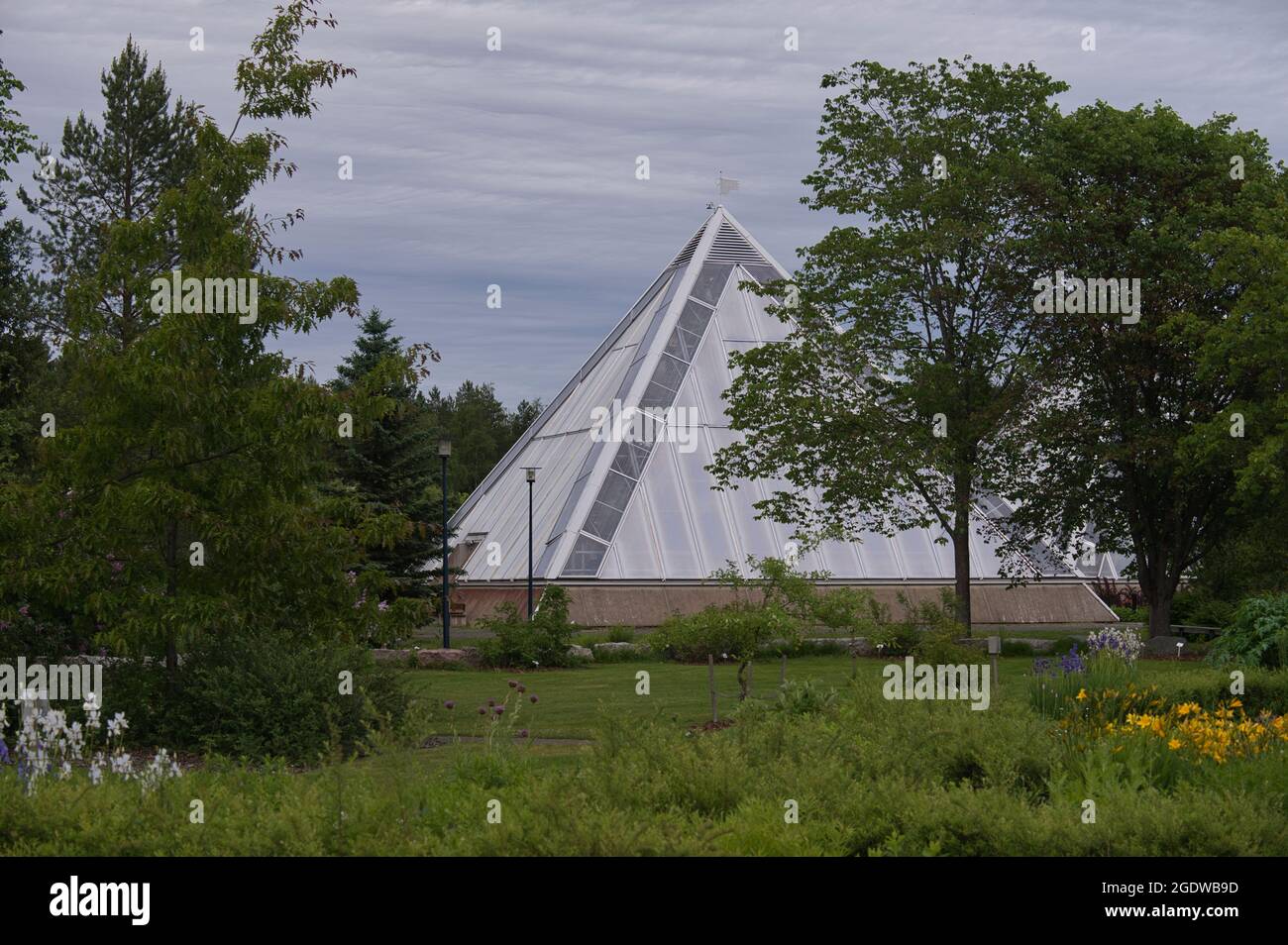 Pyramid shaped greenhouse in Oulu Botanical Garden, Finland Stock Photo