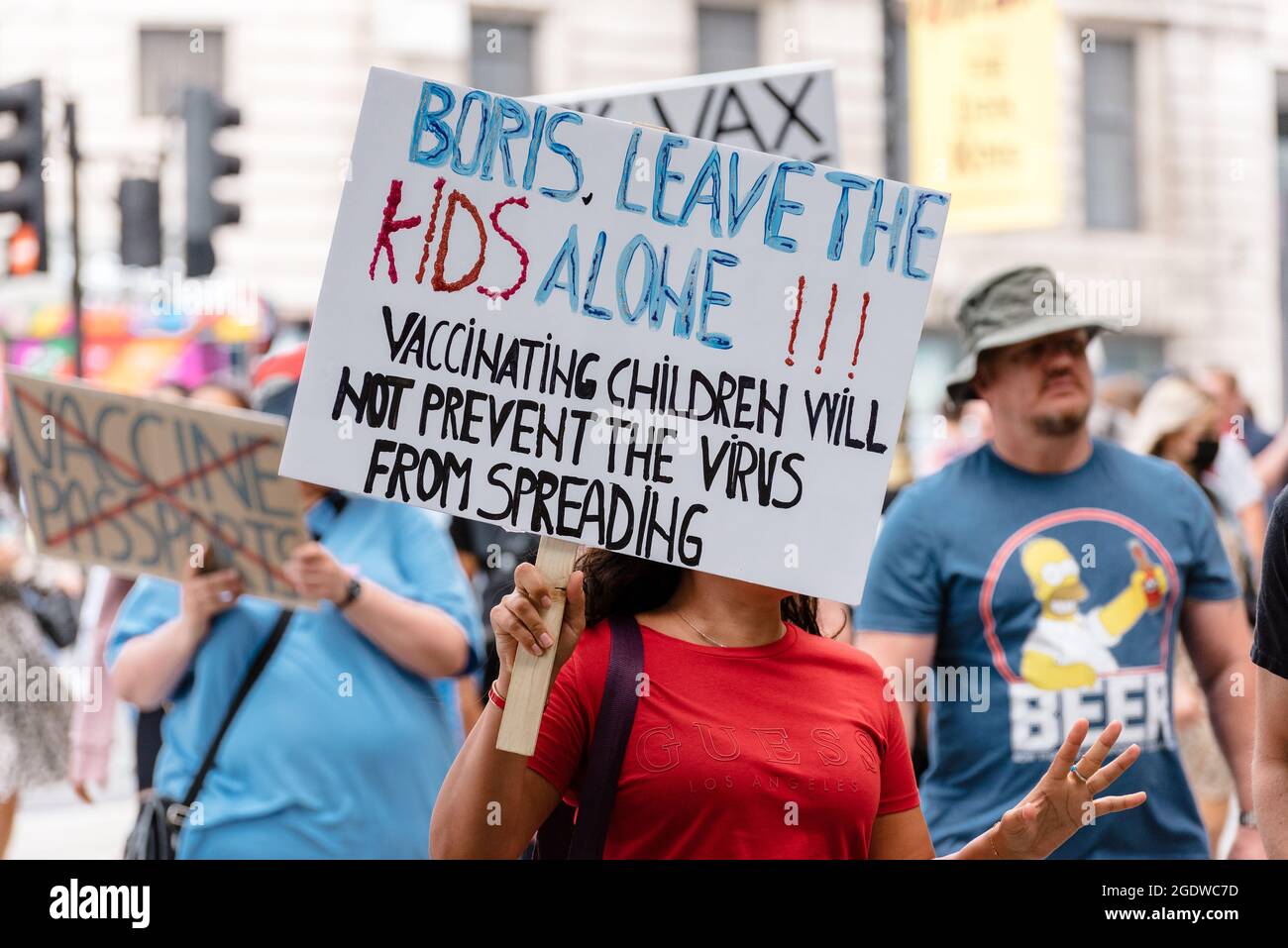 London, UK. 14 August 2021. Protesters march to BBC headquarters against vaccinations, vaccine passports and COVID restrictions. Stock Photo