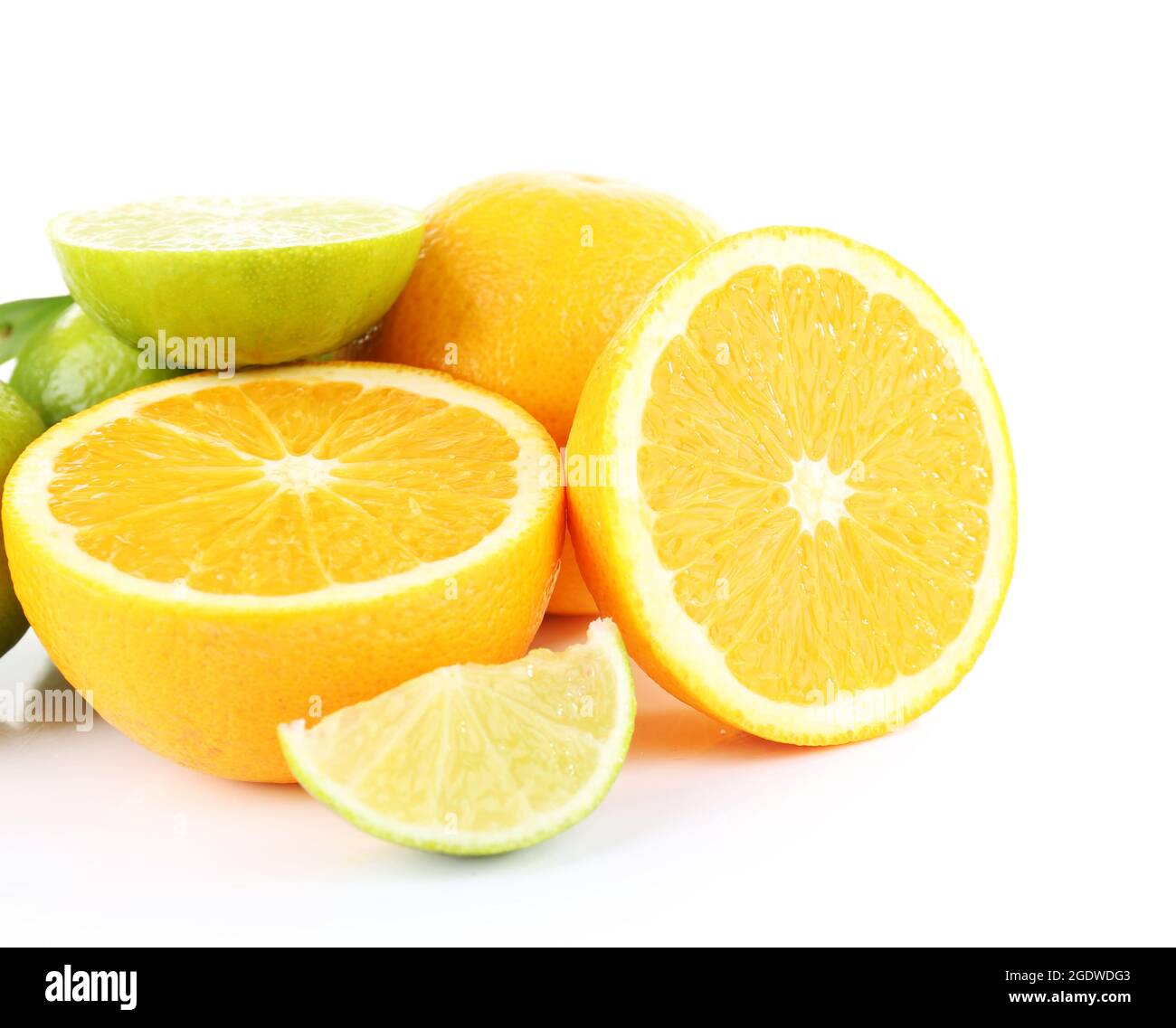 Fresh juicy limes and oranges isolated on white Stock Photo - Alamy