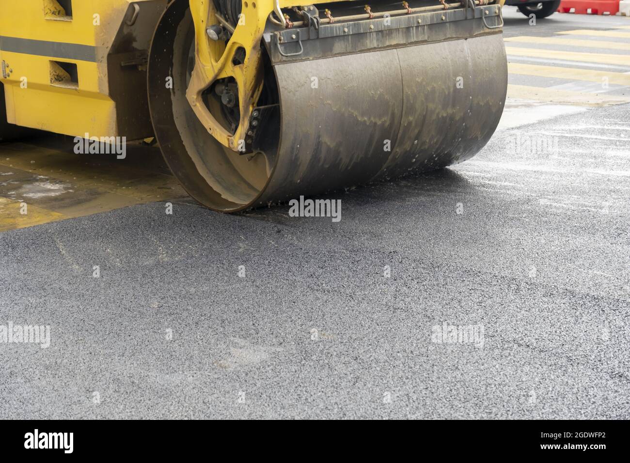Paving the road over a bridge with porous asphalt for traffic noise  reduction in Geneva, switzerland Stock Photo - Alamy