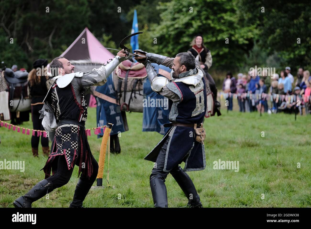 Melrose, UK. 15th Aug, 2021. Les Amis, jousting knights & horsemanship display from the medieval period, in tribute to Sir Walter Scotts 'Ivanhoe' The inaugural festival, ScottFest 2021, is being held at Abbotsford, Scott's home in the Scottish Borders, over the legendary author's 250th birthday weekend, Saturday August 14th and Sunday August 15th. Credit: Rob Gray/Alamy Live News Stock Photo