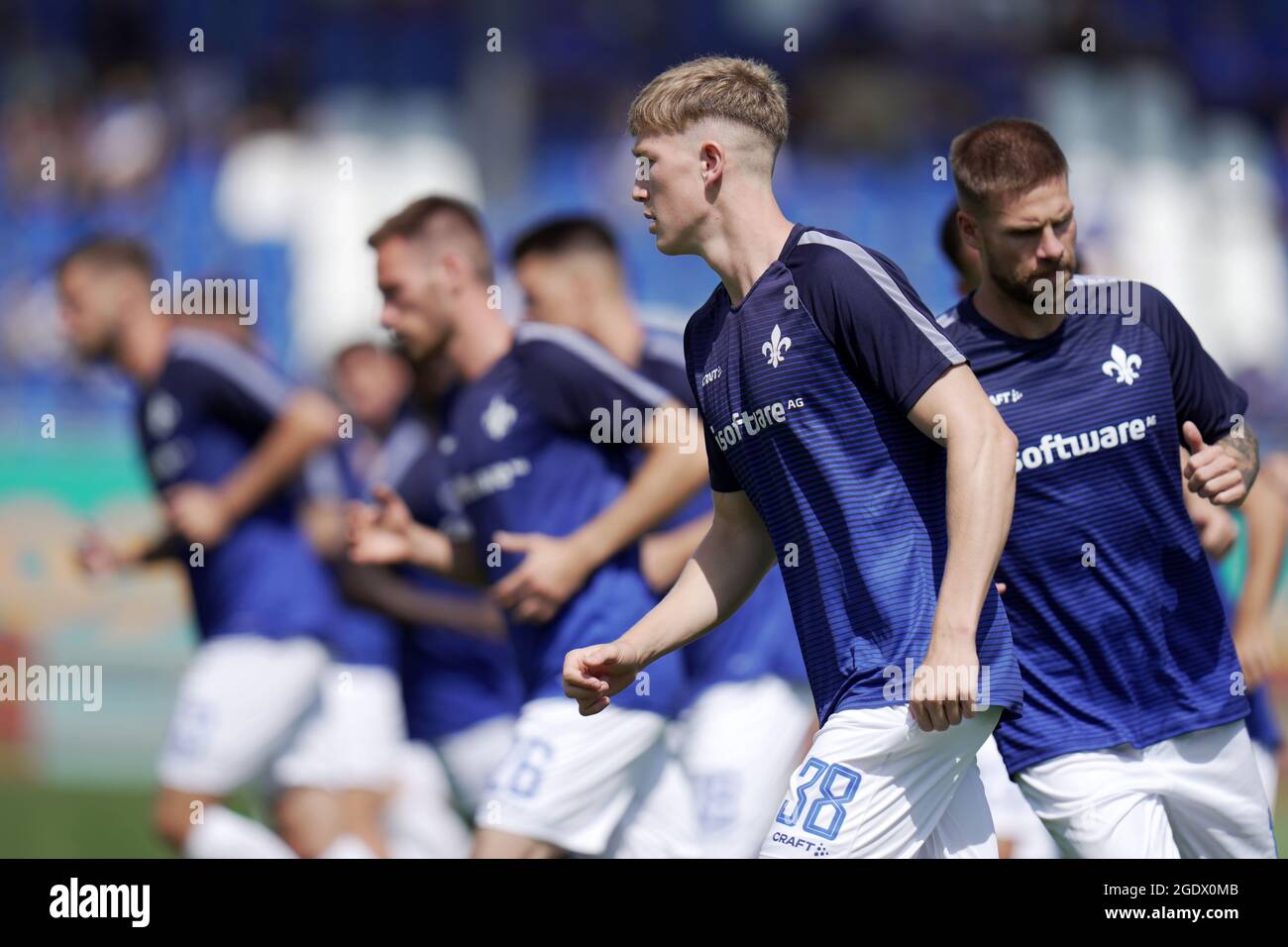 Darmstadt, Germany. 15th Aug, 2021. Soccer: 2nd Bundesliga, Darmstadt 98 - FC Ingolstadt 04, Matchday 3 at Merck-Stadion am Böllenfalltor. Darmstadt's Clemens Riedel (front) during warm-up training. Credit: Thomas Frey/dpa - IMPORTANT NOTE: In accordance with the regulations of the DFL Deutsche Fußball Liga and/or the DFB Deutscher Fußball-Bund, it is prohibited to use or have used photographs taken in the stadium and/or of the match in the form of sequence pictures and/or video-like photo series./dpa/Alamy Live News Stock Photo
