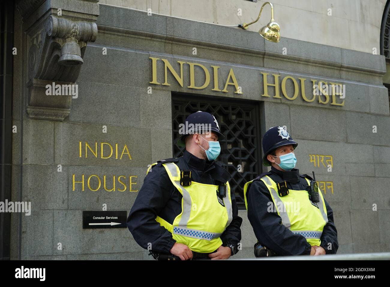 Police officers outside the Indian High Commission at India House, London, ahead of an expected demonstration from members of the Sikh community to mark India's Independence Day. Picture date: Sunday August 15, 2021. Stock Photo