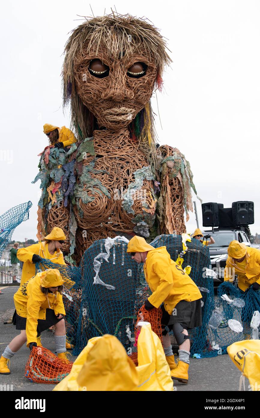 Storm, a ten-metre tall puppet of a mythical goddess of the sea created by Edinburgh-based visual theatre company Vision Mechanics, on the seafront at North Berwick, East Lothian, during a performance at the Fringe By The Sea festival. Picture date: Sunday August 15, 2021. Stock Photo