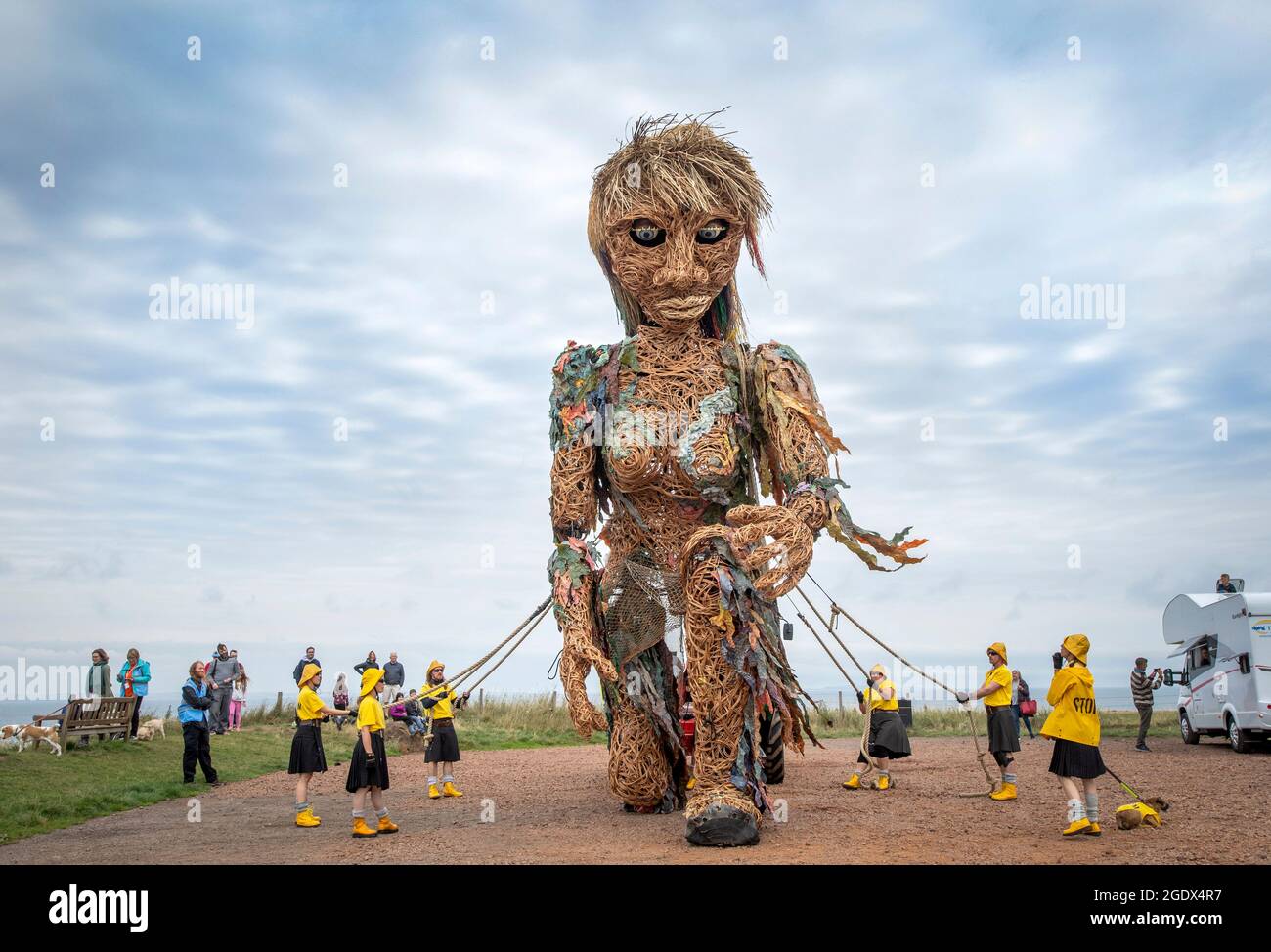 Storm, a ten-metre tall puppet of a mythical goddess of the sea created by Edinburgh-based visual theatre company Vision Mechanics, on the seafront at North Berwick, East Lothian, during a performance at the Fringe By The Sea festival. Picture date: Sunday August 15, 2021. Stock Photo
