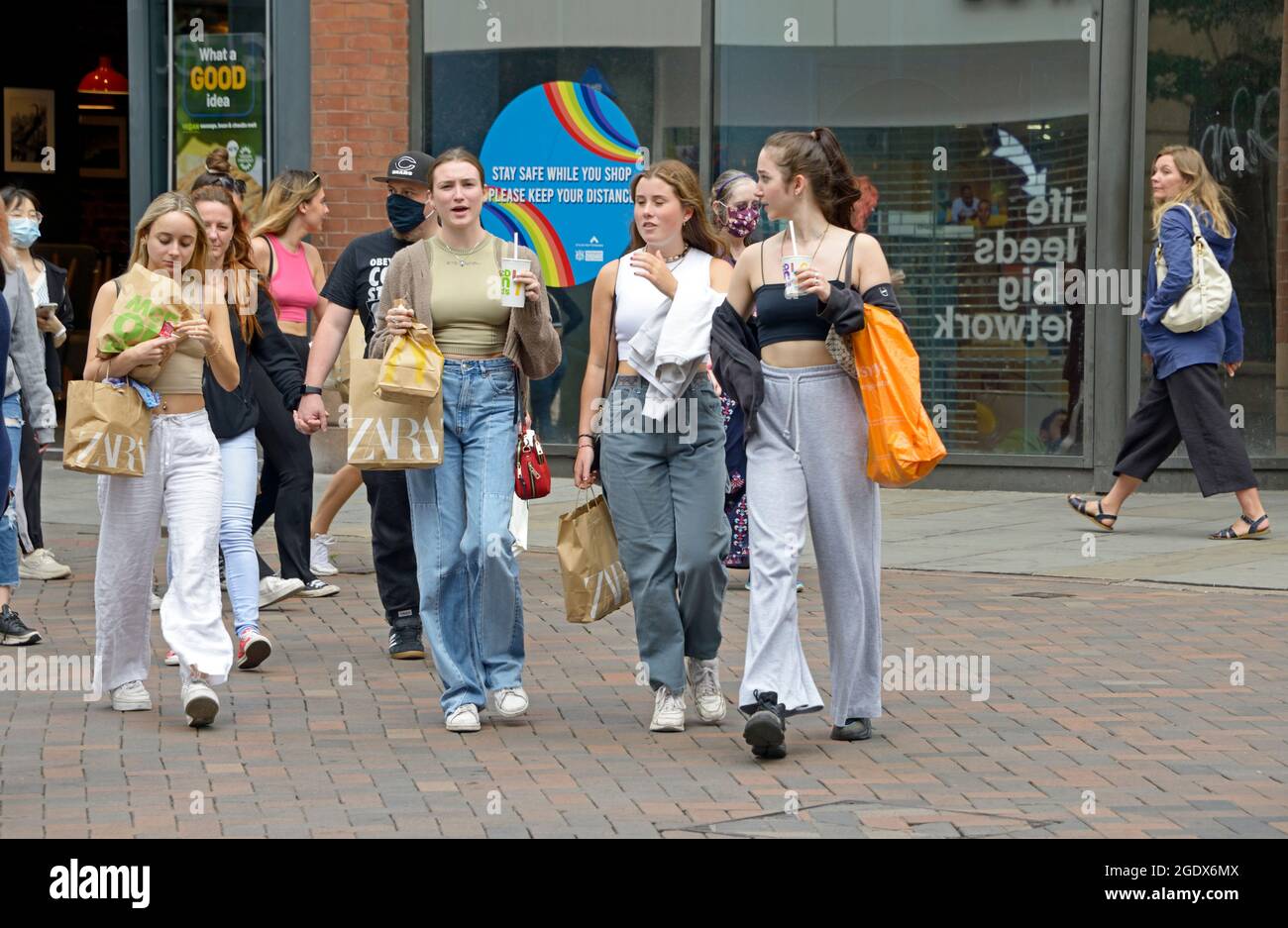 Group of young women, out shopping in the city. Stock Photo