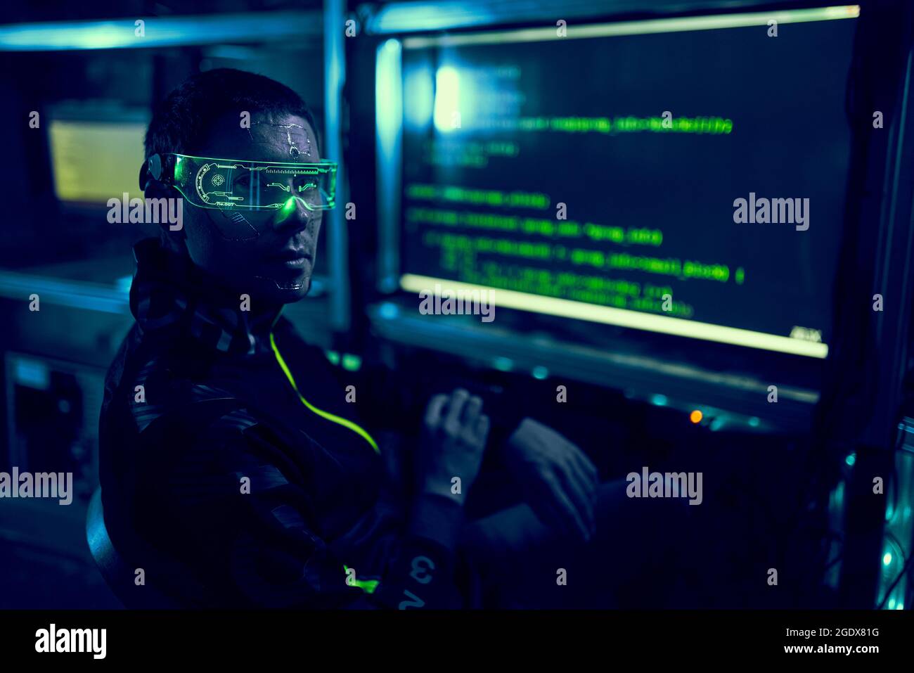 Cyber hacker breaks into databases to obtain information using a computer. Cybercrime and data security concept. Stock Photo