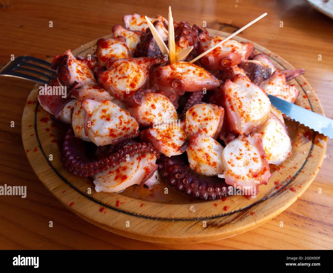 Polbo a feira meaning fair-style octopus in gallego or pulpo a la gallega in Spanish meaning Galician-style octopus a traditional Galician dish Stock Photo