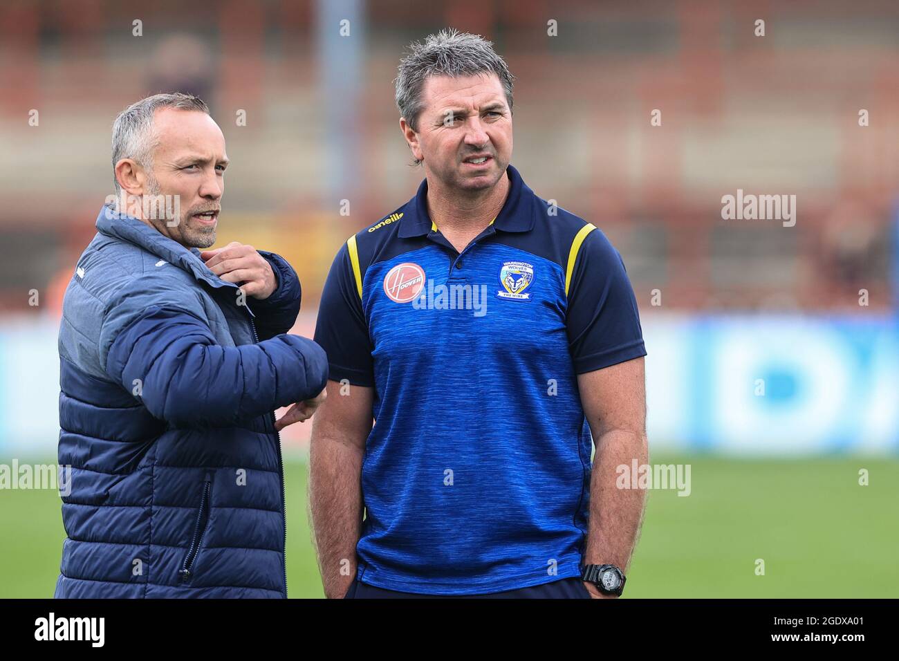Wakefield, UK. 15th Aug, 2021. Steve Price Head Coach of Warrington Wolves and Andrew Henderson inspect the pitch in Wakefield, United Kingdom on 8/15/2021. (Photo by Mark Cosgrove/News Images/Sipa USA) Credit: Sipa USA/Alamy Live News Stock Photo