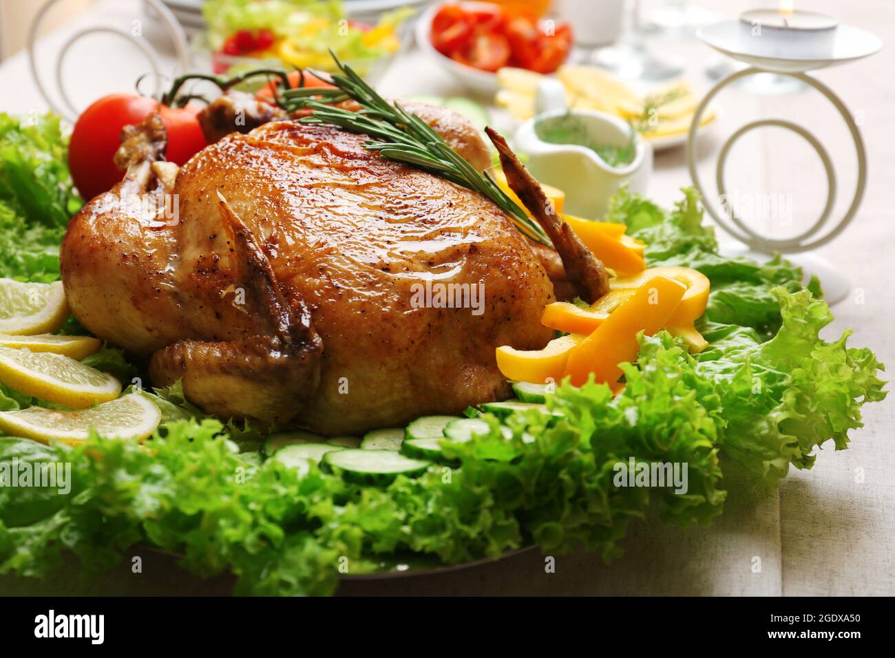 Baked chicken for festive dinner Stock Photo - Alamy