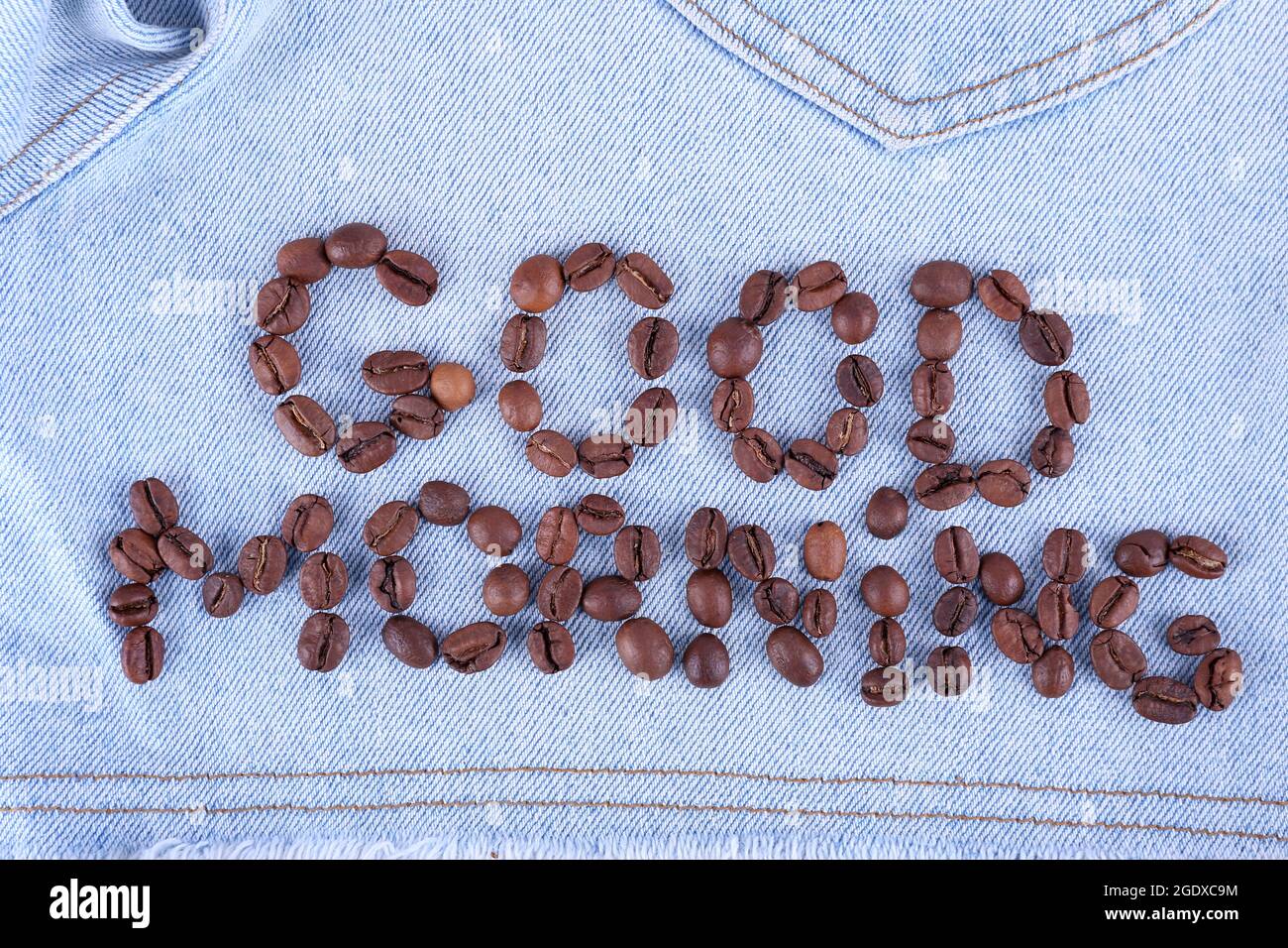 Sign Good Morning made of coffee beans on jeans background Stock Photo -  Alamy