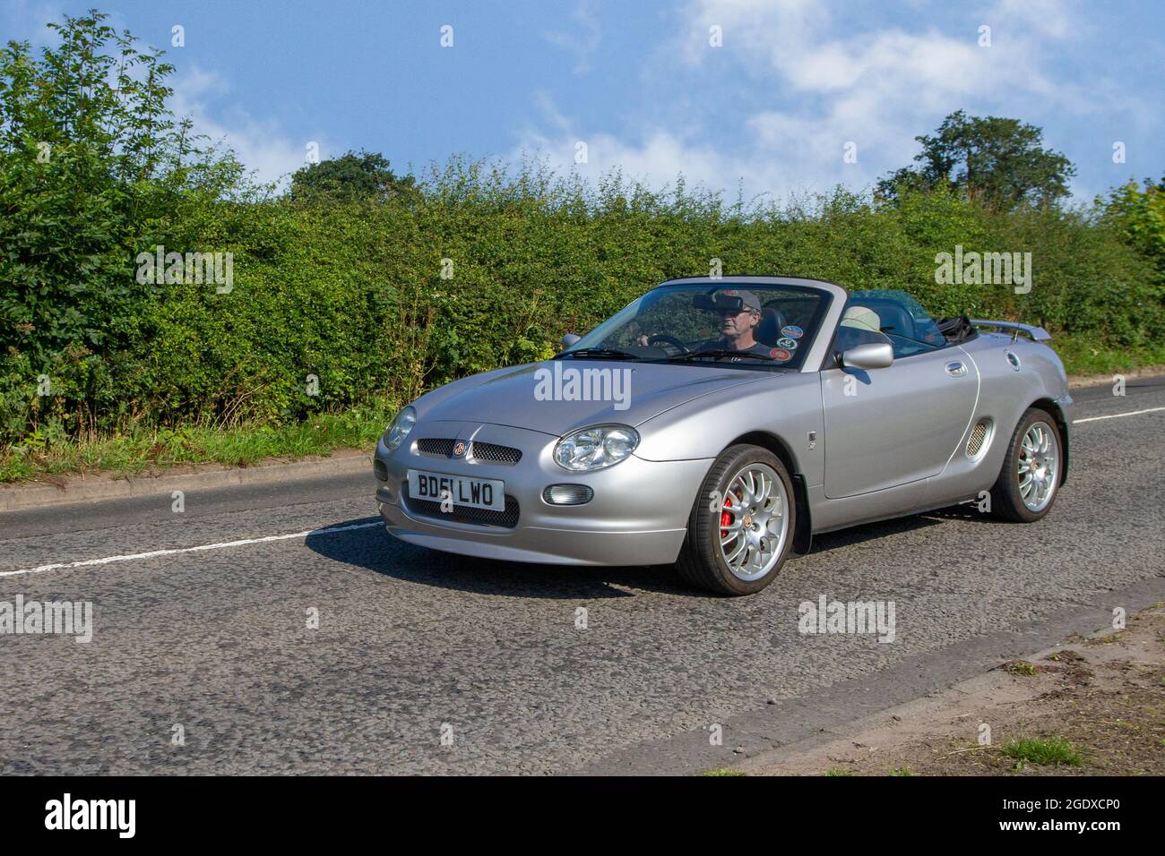 2001 silver MG MGF 5 speed manual 1796cc petrol cabriolet en-route to Capesthorne Hall classic July car show, Cheshire, UK Stock Photo