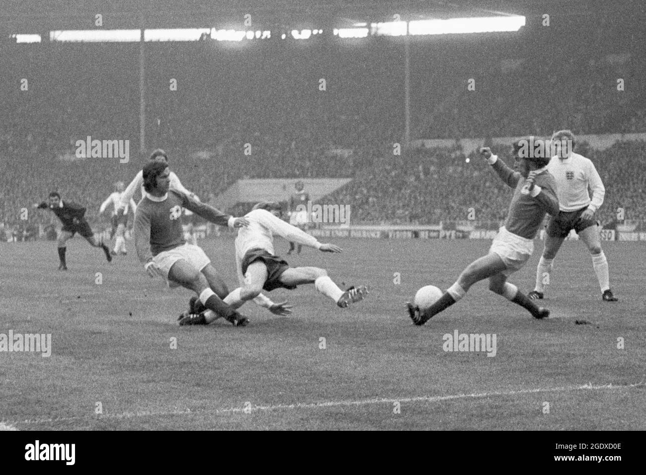 File photo dated 29-04-1972 of West Germany's Gerd Muller (l) and Paul Breitner (r) block England's Colin Bell (c) as Francis Lee (far right) looks on. West Germany won the game 3-1. Issue date: Sunday August 15, 2021. Stock Photo
