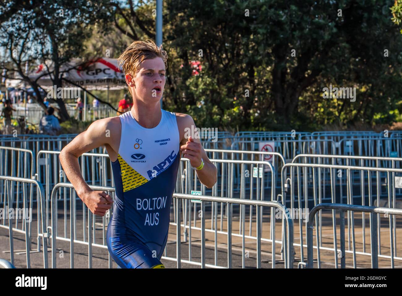 Junior triathlete Harry Bolton runs past the barriers during the 2XU  Triathlon Series 2021. (Photo by Alexander Bogatyrev / SOPA Images/Sipa USA  Stock Photo - Alamy