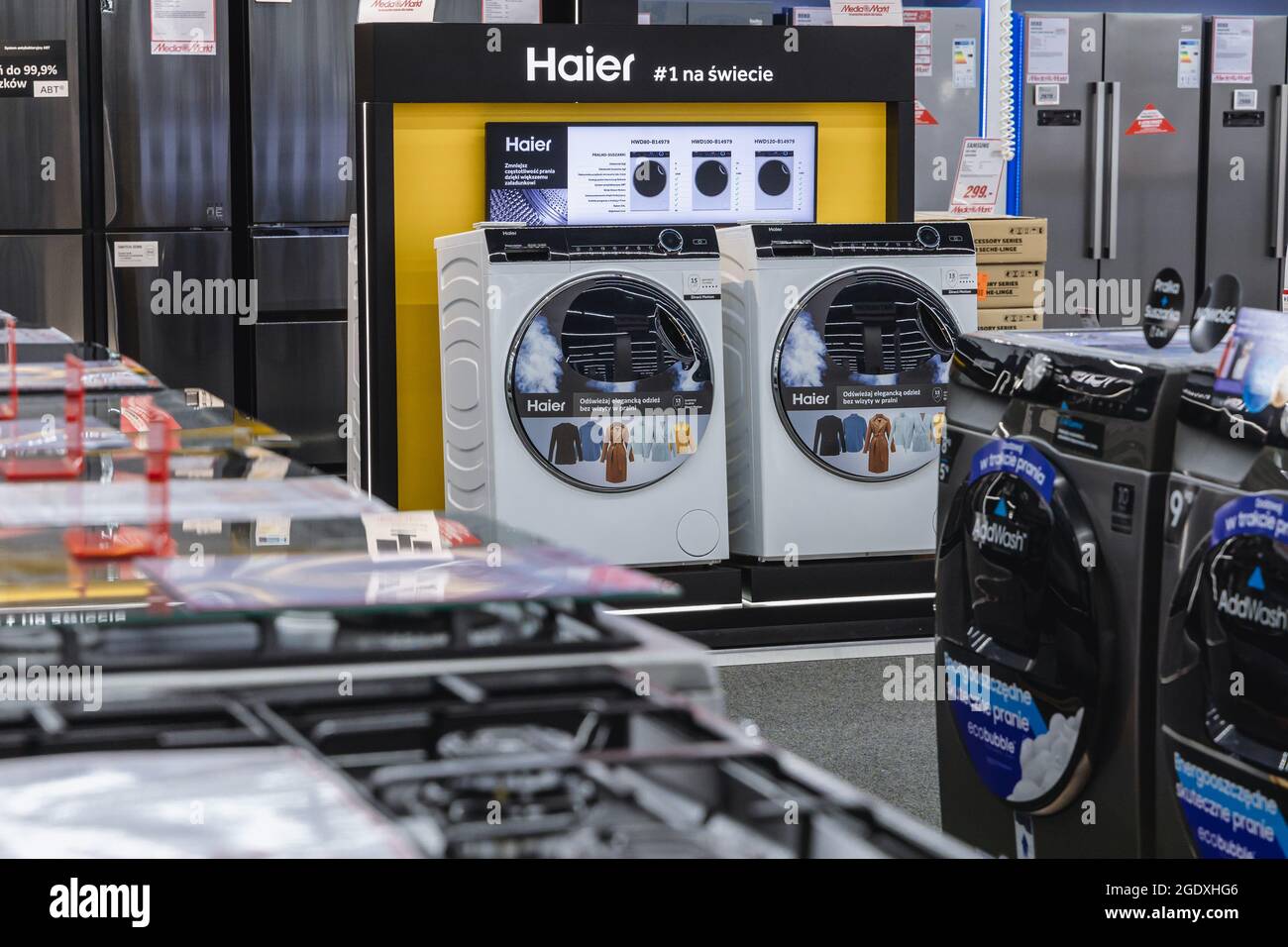 Haier washing machines in MediaMarkt store with household appliances and consumer electronics in Warsaw, Poland Stock Photo