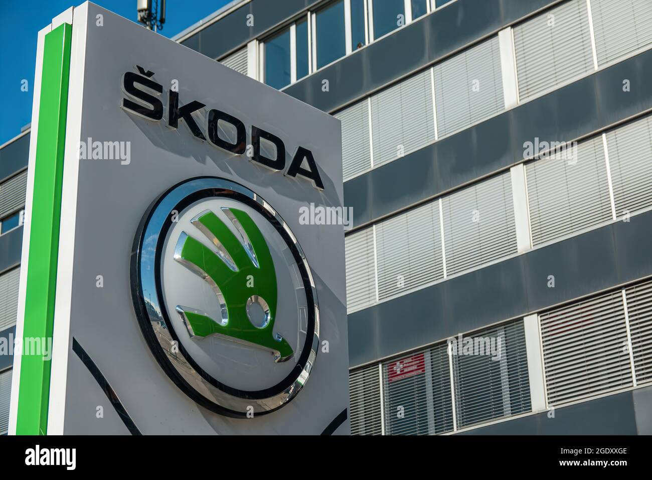 ALTSTETTEN-ZH, SWITZERLAND - FEBRUARY 20, 2020: Skoda store in Zürich-Altstetten and the logo of the car brand Stock Photo