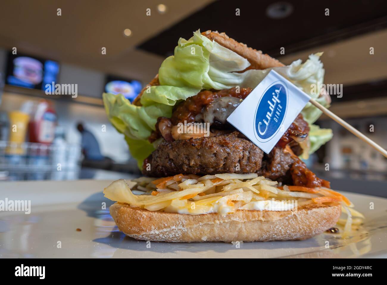 Deitingen, Switzerland - July 10, 2020: A huge and tasty burger at Cindy’s fast food restaurant Stock Photo