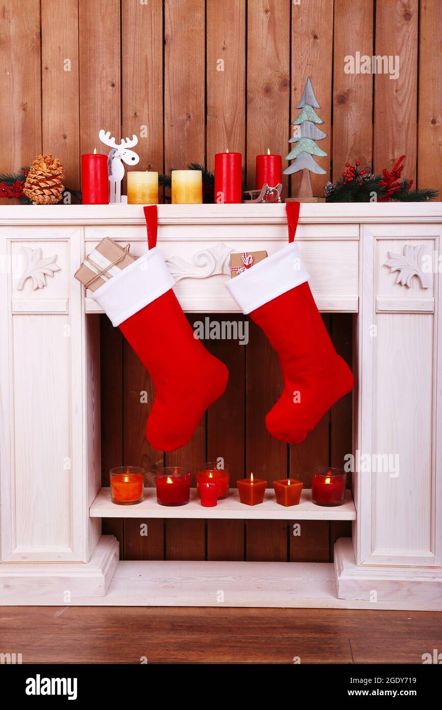 Christmas socks hanging on fireplace in room Stock Photo Alamy Socks Hanging Christmas