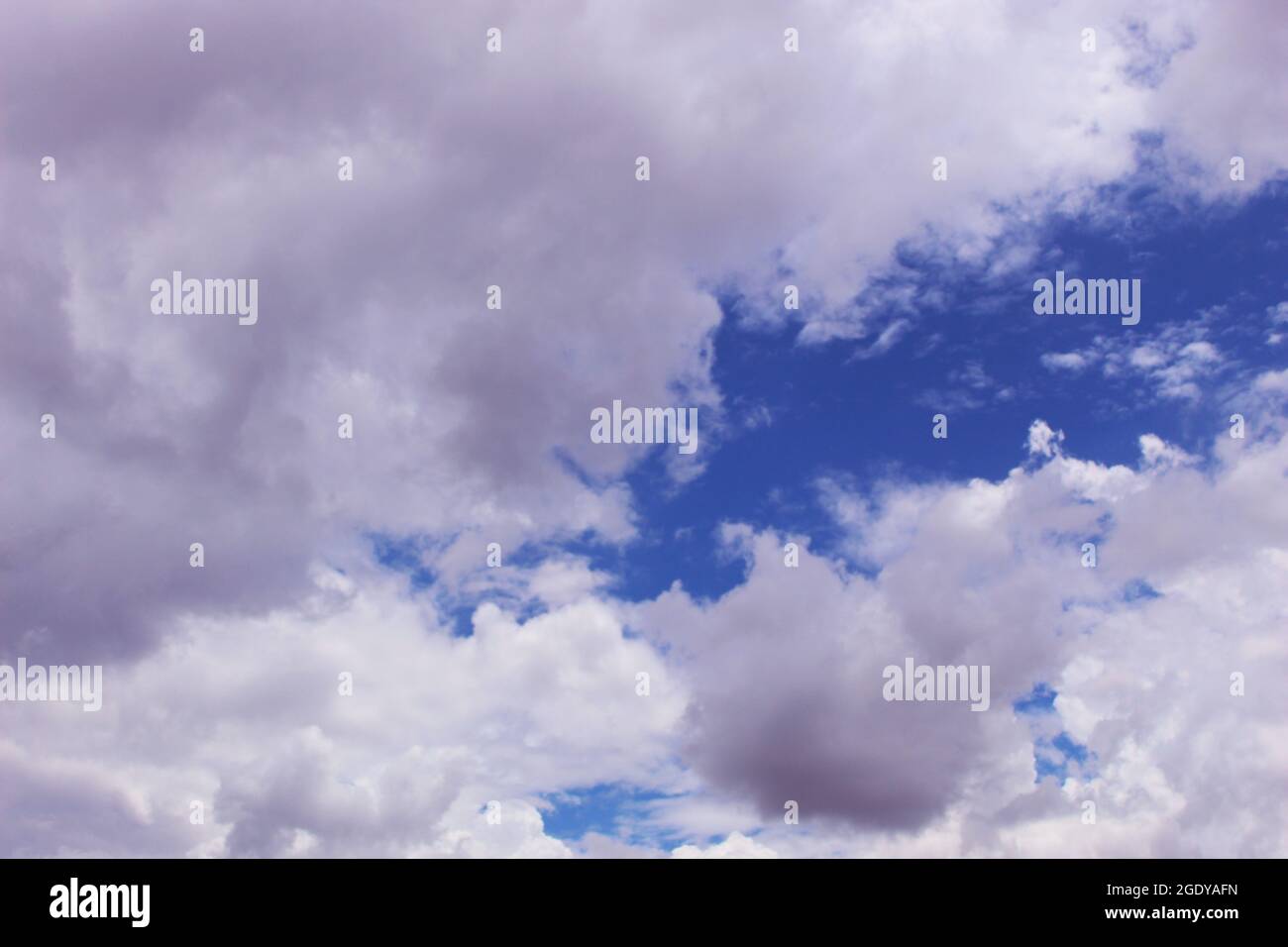 Blue sky full of clouds. Stock Photo