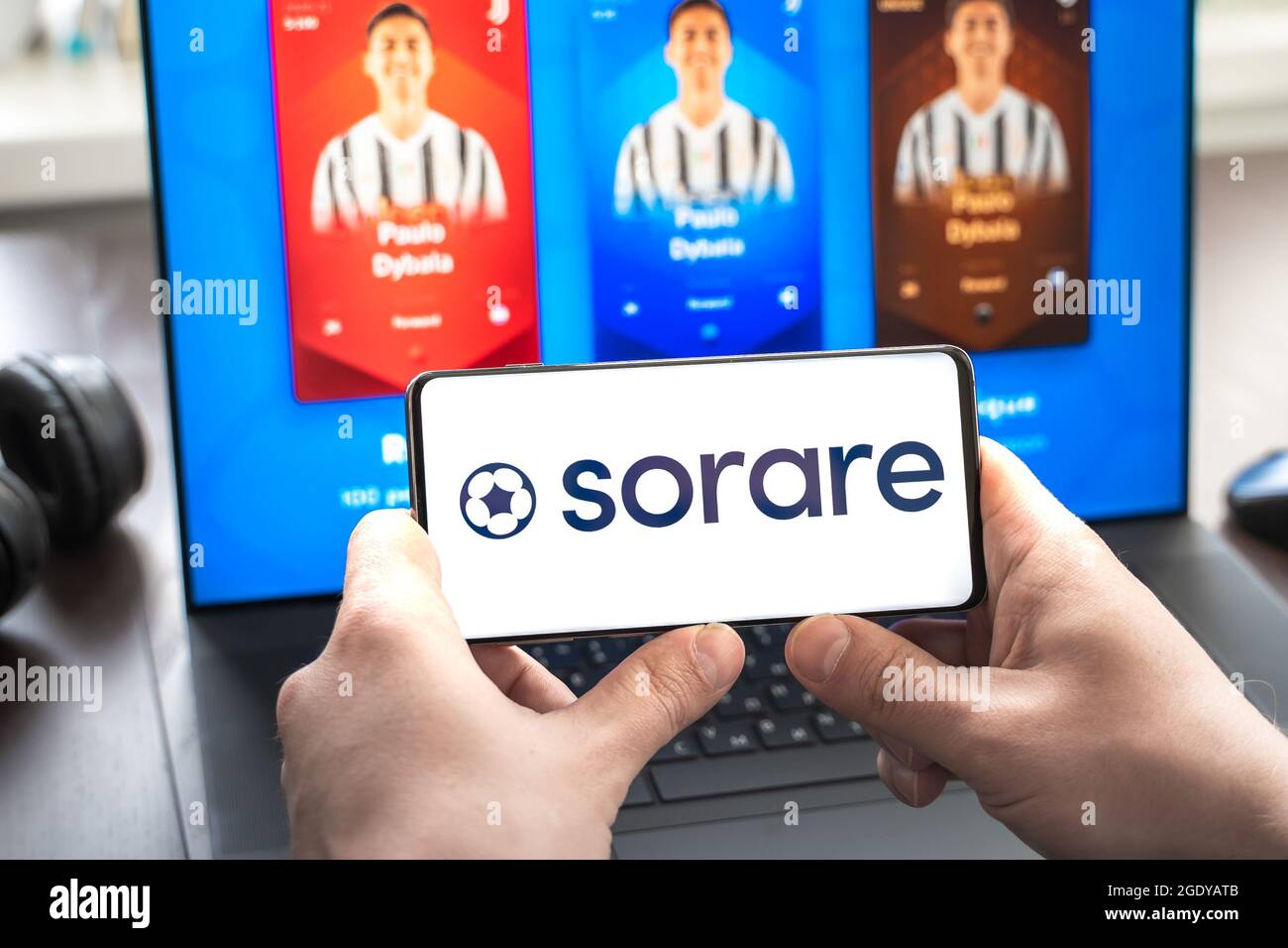 Russia Moscow 30.05.2021.Logo,screenshot of blockchain nft ethereum  cryptocurrency sport football, soccer game Sorare in laptop,mobile  phone.Man playi Stock Photo - Alamy