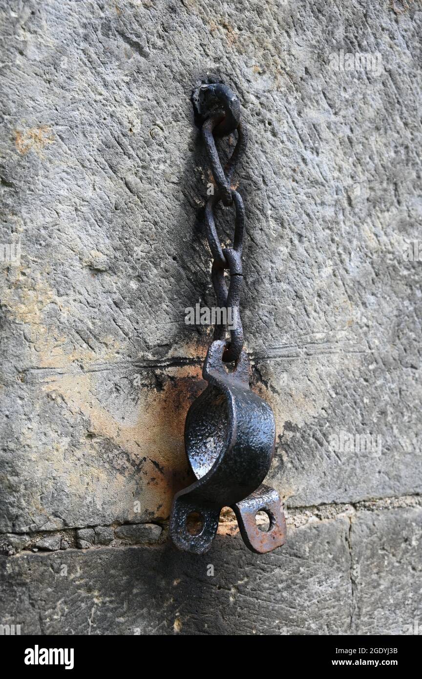 Chains of a medieval pillory at the village church in Peetzen Stock Photo
