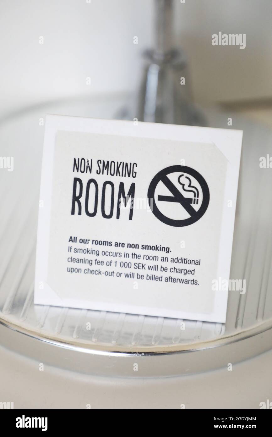 Non smoking room signs in a hotel room Stock Photo Alamy