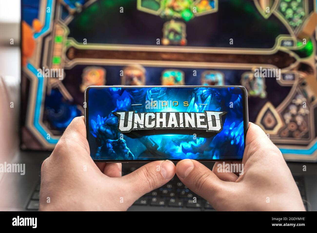 Russia Moscow 30.05.2021.Logo, screenshot of blockchain nft ethereum  cryptocurrency game Unchained gods in laptop.mobile phone. Man  playing,collecting Stock Photo - Alamy