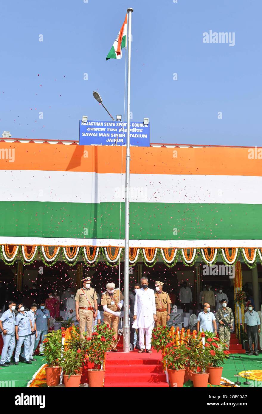 Jaipur, Rajasthan, India, August 15, 2021: Rajasthan Chief Minister Ashok Gehlot stands for the national anthem after hoisting the Indian National flag Tricolor during the 75th Independence Day celebrations at Sawai Mansingh Stadium in Jaipur. Credit: Sumit Saraswat/Alamy Live News Stock Photo
