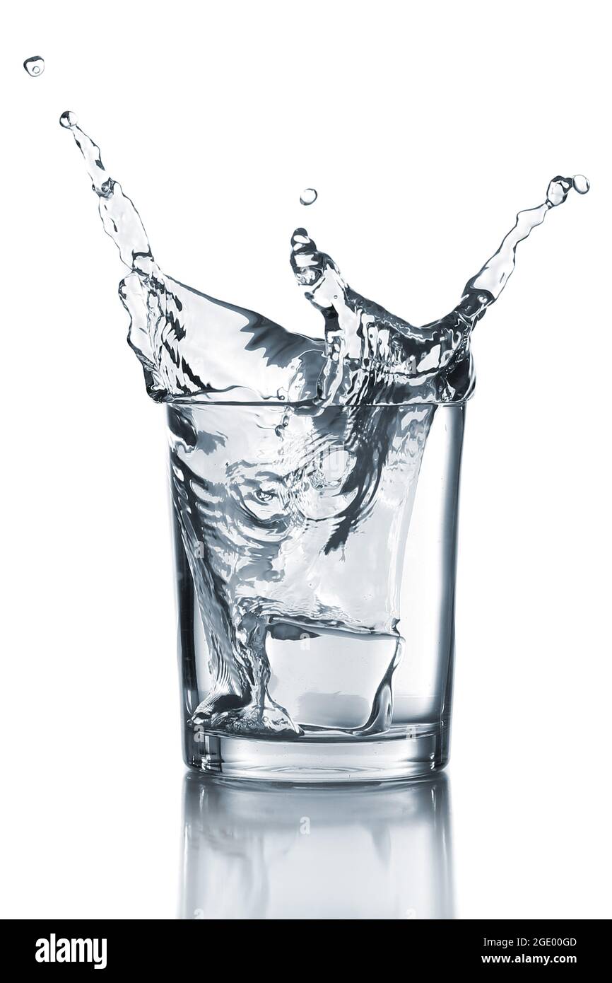 Water splash with ice in glass isolated on white Stock Photo - Alamy