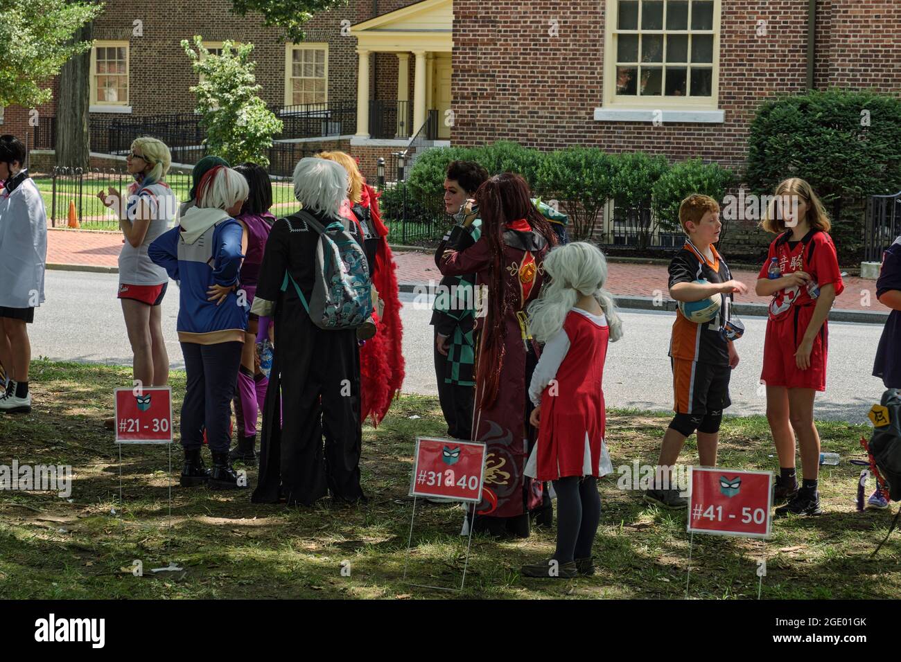Participants await their turn during cosplay and character costume