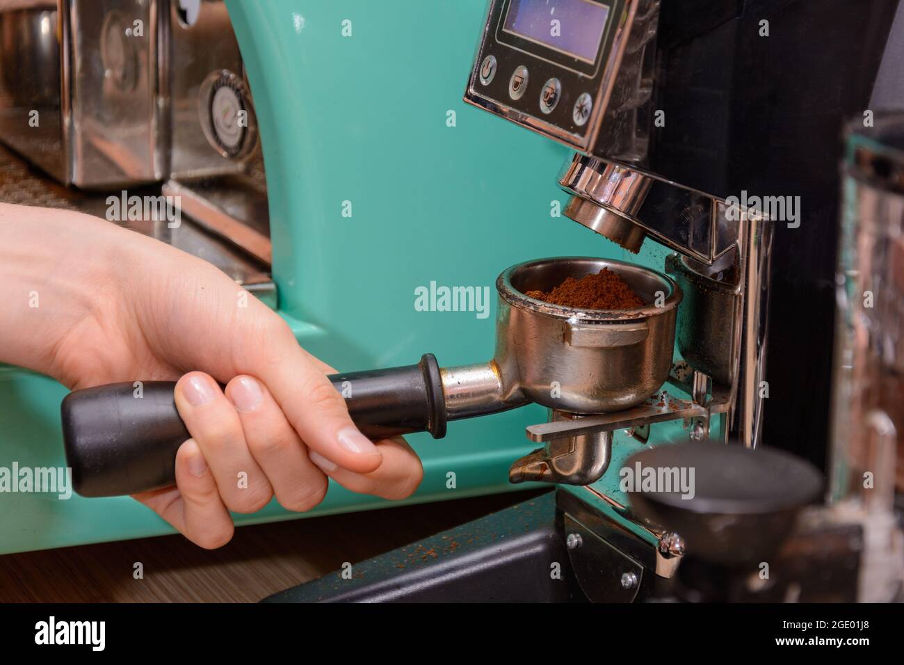 Coffee grinder, dispenser, pro coffee preparation. Real photo Stock