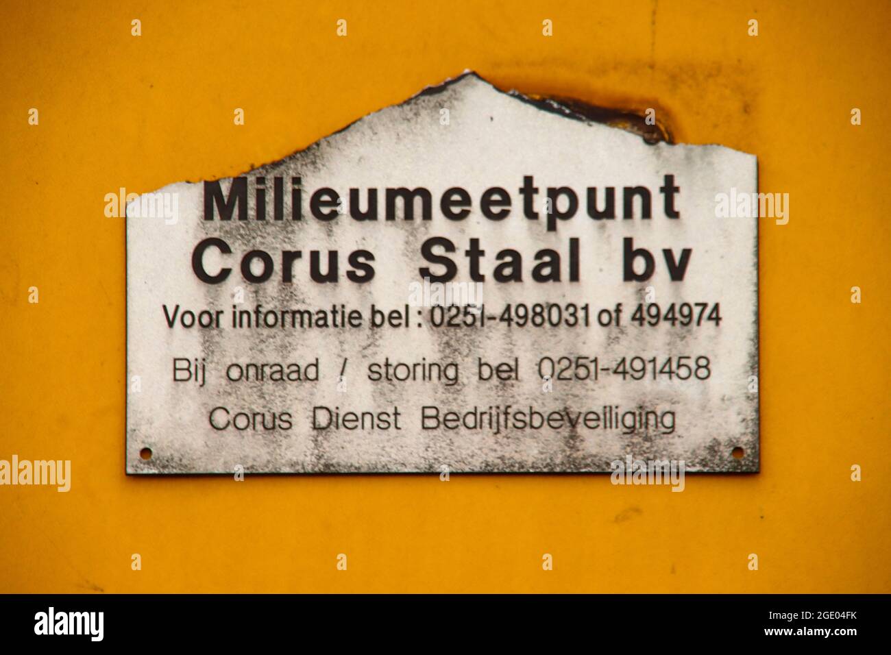 Old sign of the environment measurement point (Milieumeetpunt) of Tata (corus) steel in IJmuiden the Netherlands Stock Photo