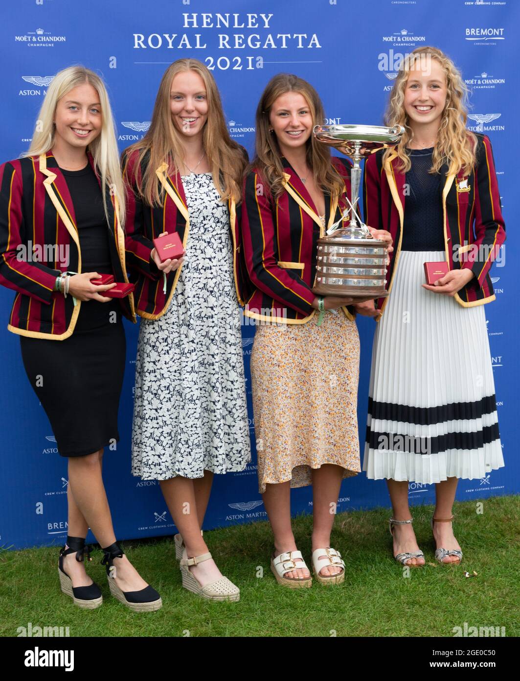 Henley Royal Regatta, 15 August 2021 Finals Day - . The Shiplake College 'A' Junior womens quadruple  sculls  holding  their Diamond Jubilee Challenge Cup  won in the finals by beating    Marlow Rowing Club  in the finals  . Credit  Gary Blake/Alamy Live News Stock Photo