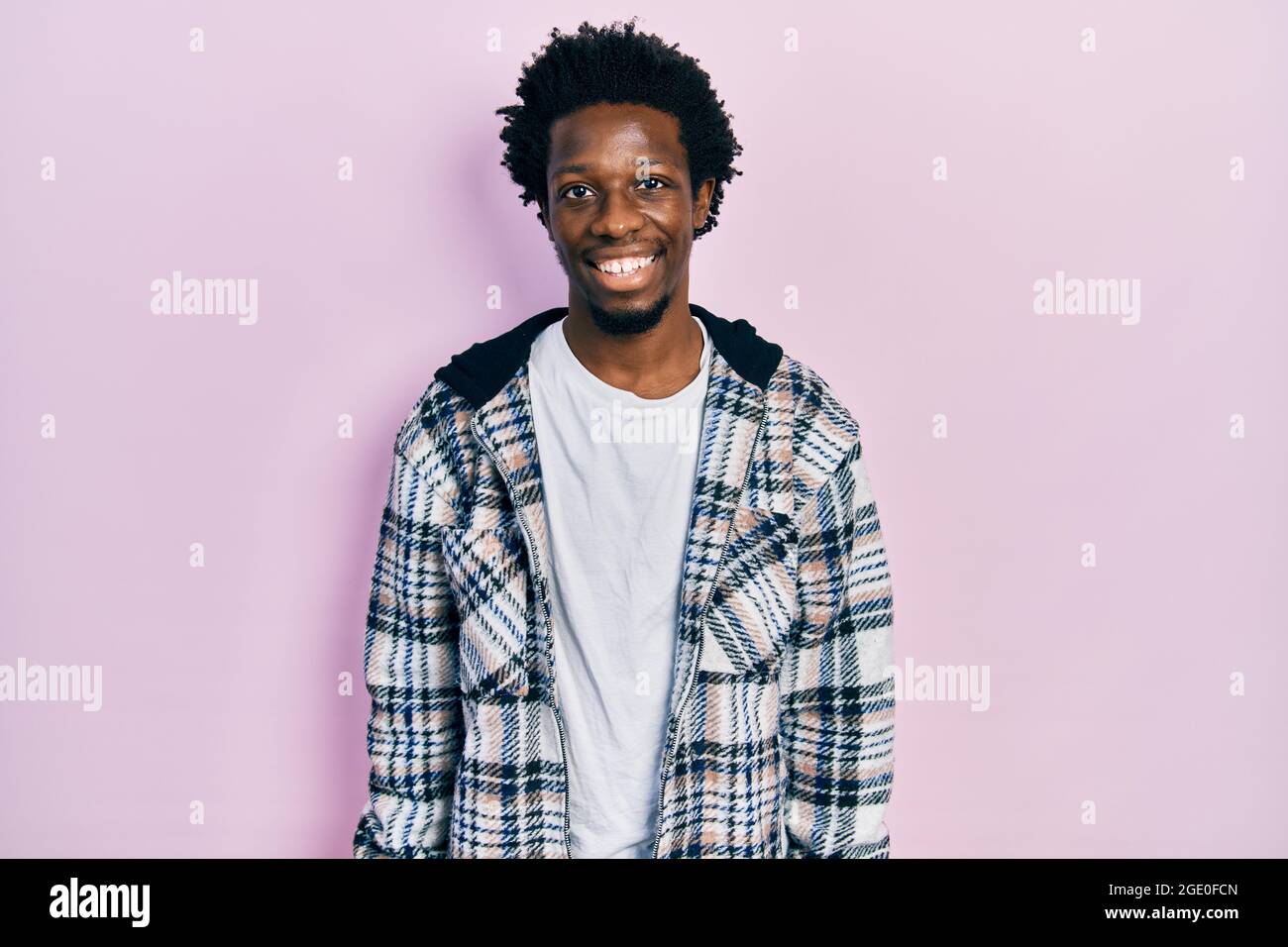 Young african american man wearing casual clothes with a happy and cool ...