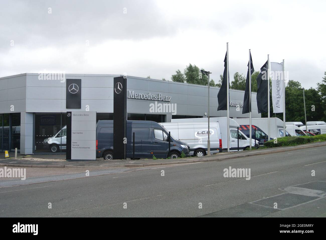 Exterior shot of new vans for sale at a Mercedes-Benz dealership, Exeter,  Devon, England, UK Stock Photo - Alamy