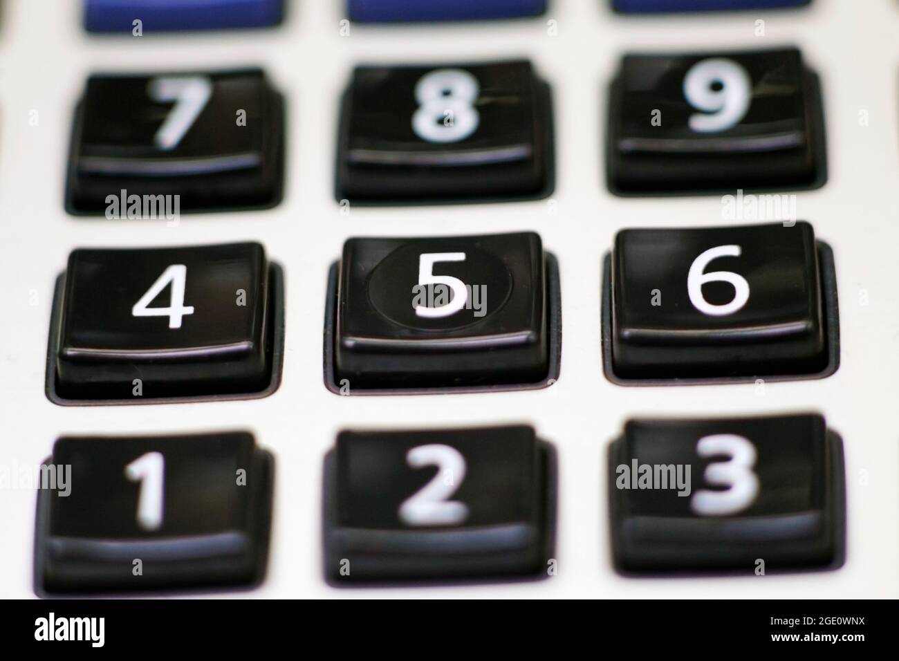 Macro detail of the keypad of a vintage digital calculator with numbers from 1 to 9 Stock Photo