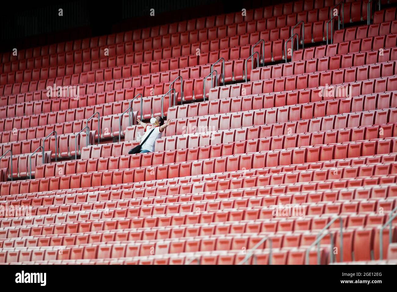 Seville, Spain. 15th Aug, 2021. Sevilla FC fan seen inside Ramon Sanchez Pizjuan Stadium during a match.It is the first time for that Spanish government to allow public at La Liga stadiums with 40% of capacity due to Covid19 pandemic. Credit: SOPA Images Limited/Alamy Live News Stock Photo