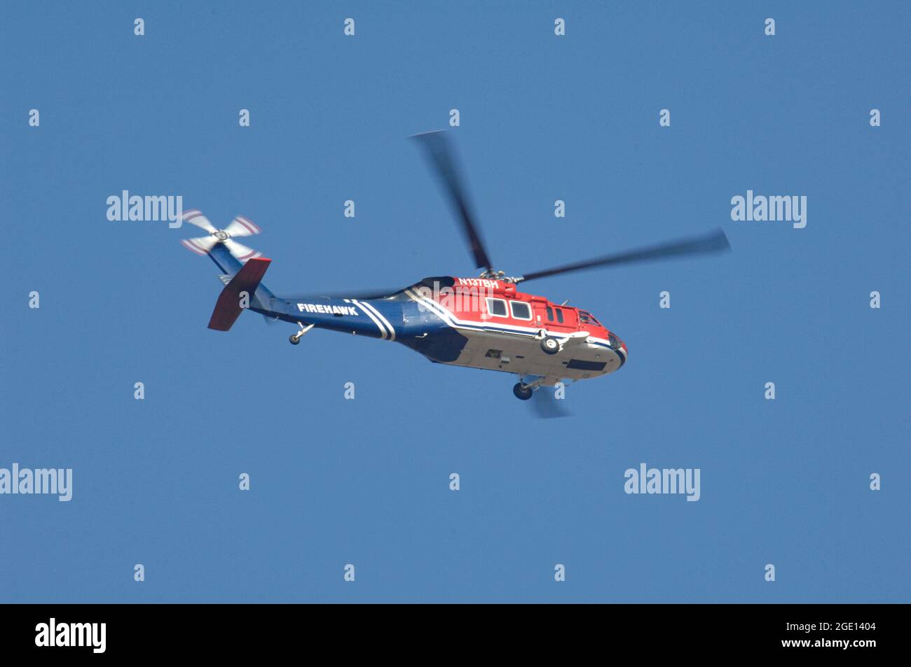 Sikorsky Firehawk demonstrator in flight over Kern County, California. Stock Photo