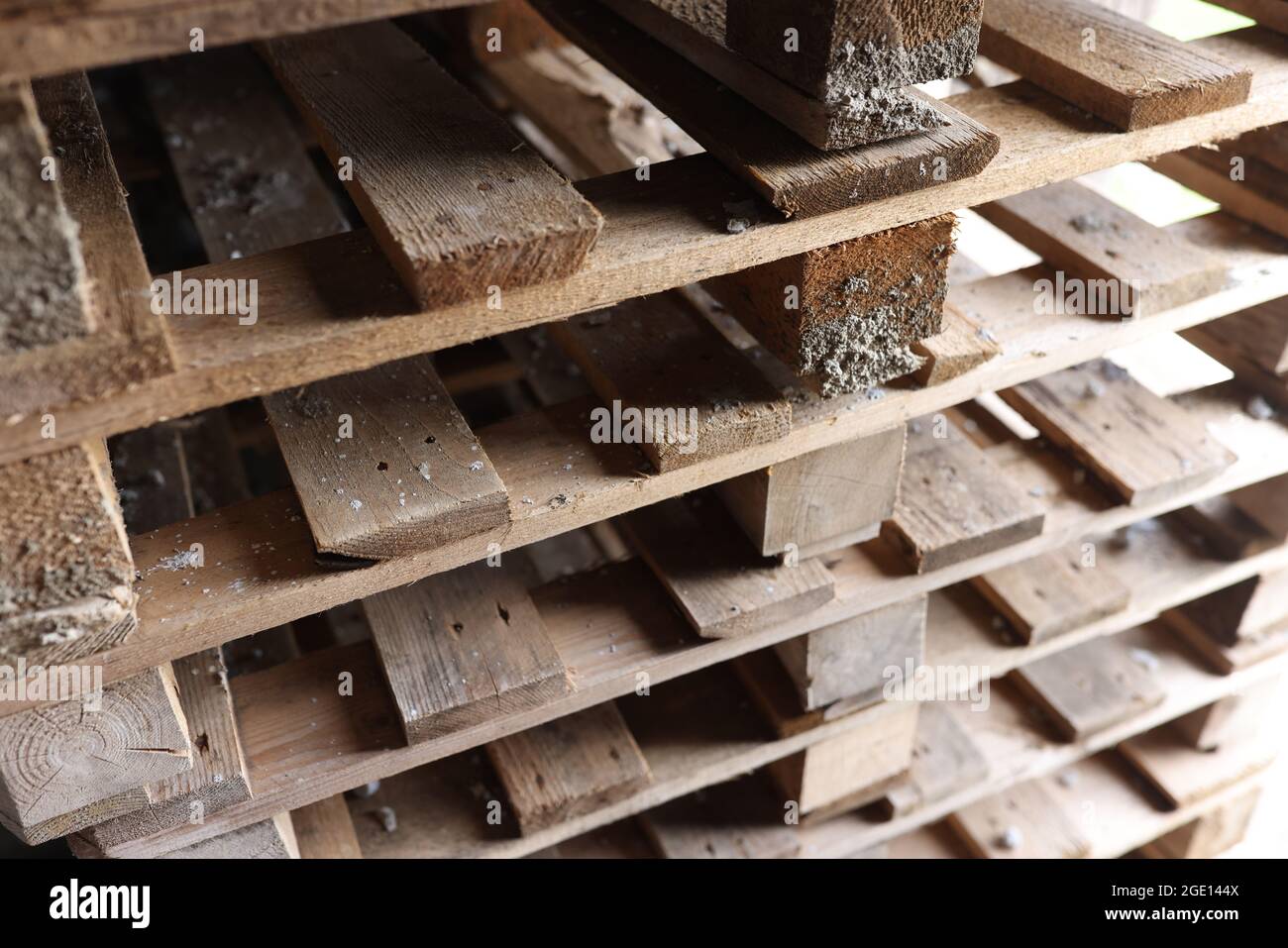 Old wooden pallets stacked on top of each other closeup Stock Photo Alamy