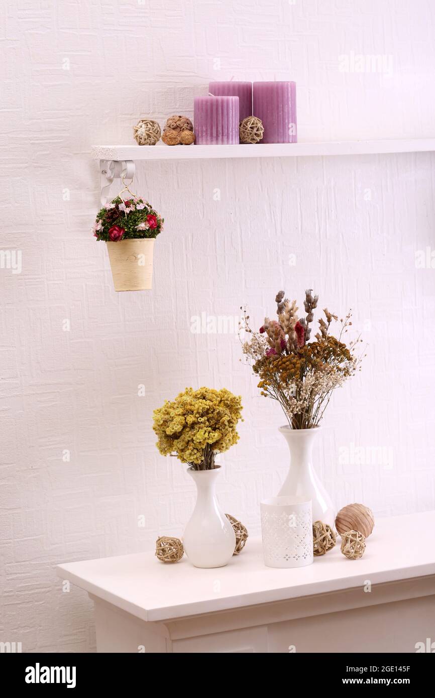 Still life of dried flowers on white wall background Stock Photo Alamy