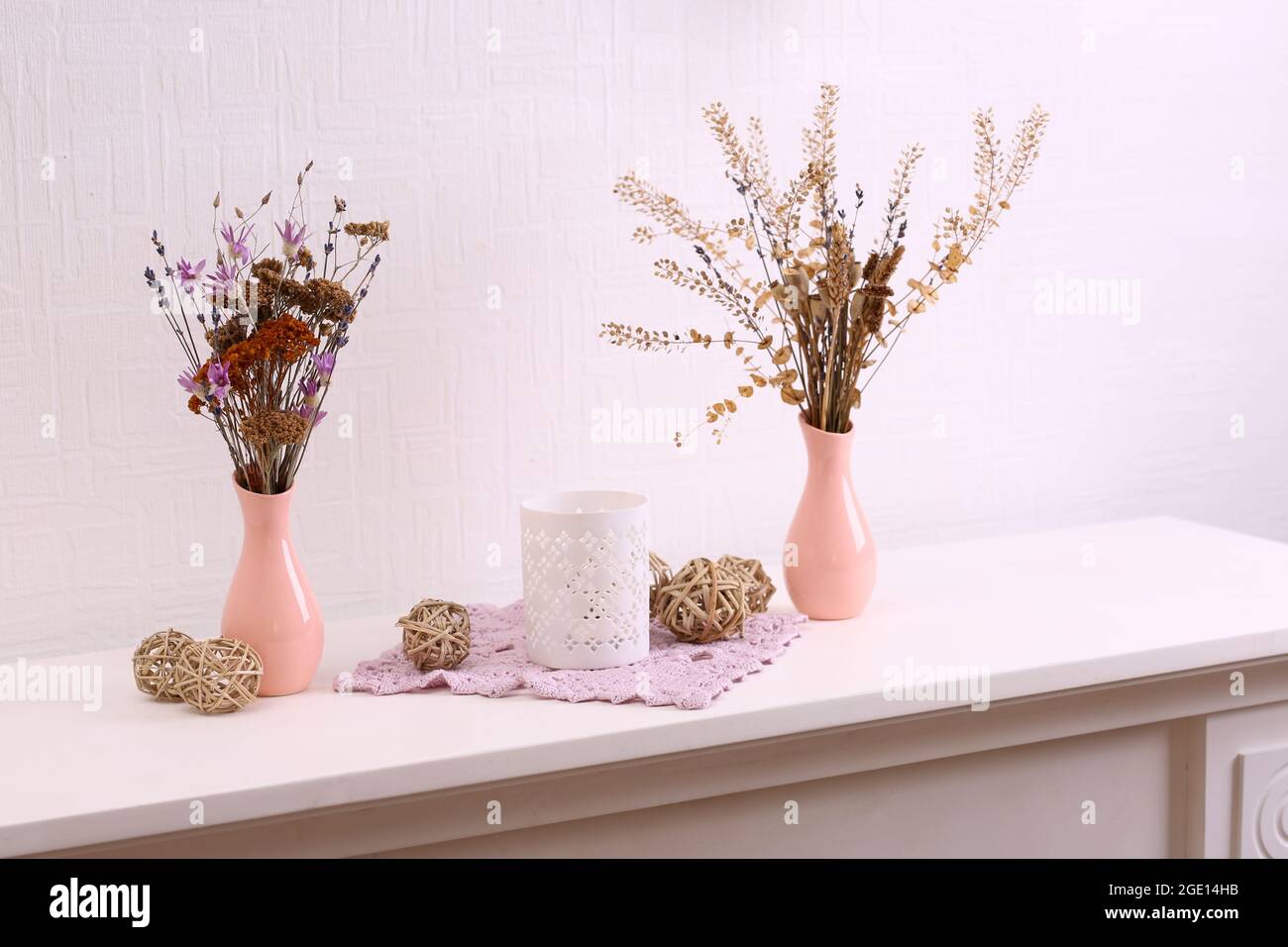 Still life of dried flowers on white wall background Stock Photo Alamy
