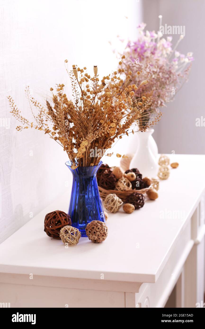 Still life of dried flowers on white wall background Stock Photo Alamy