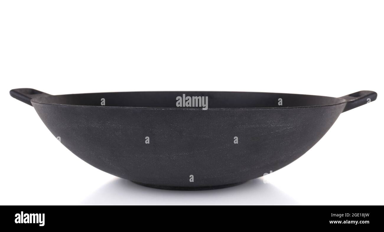 Cast iron pan isolated on white Stock Photo Alamy