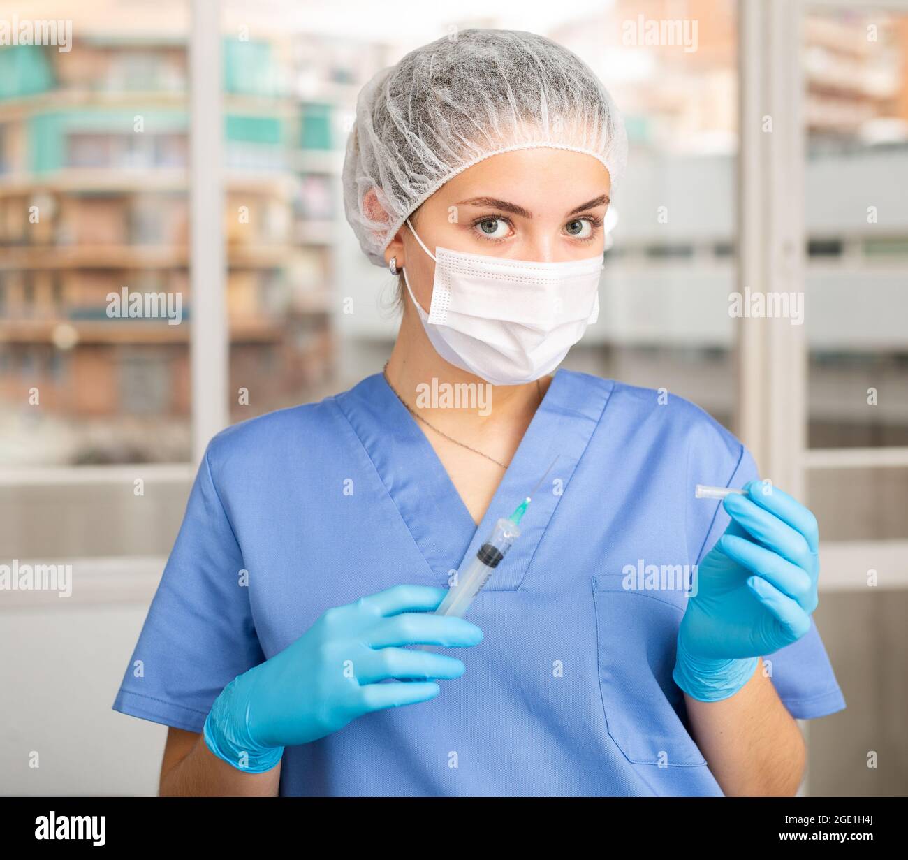 Female nurse or doctor wearing in face mask and medical uniform Stock ...
