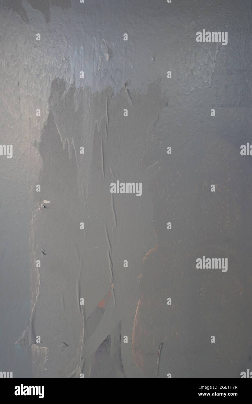 glued wall white poster paper with air pockets and bumpy uneven ...