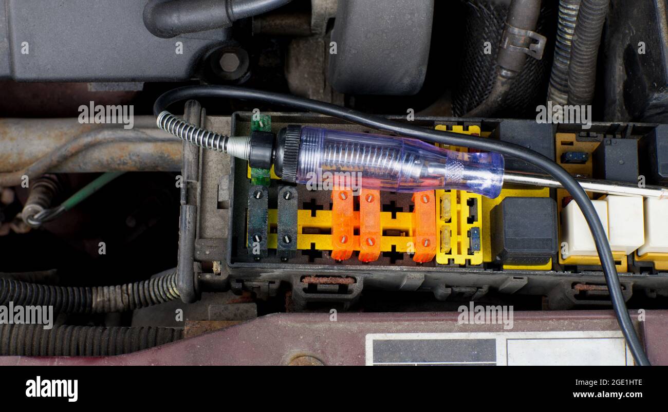 An Automotive Fusebox and a Test Light Stock Photo