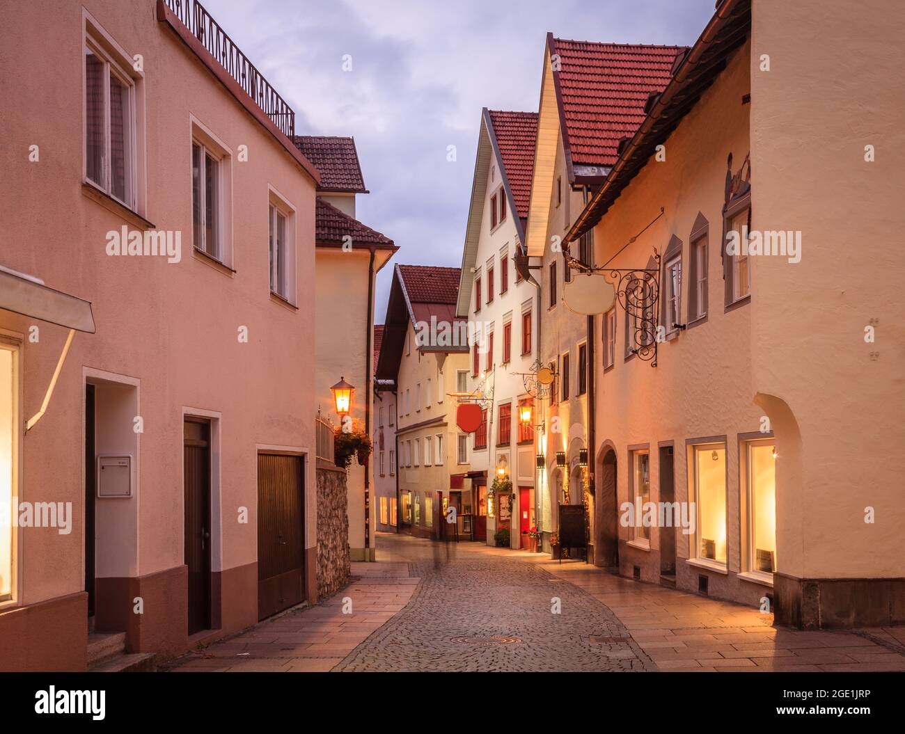 Evening street scene in the city of Fussen, Germany Stock Photo