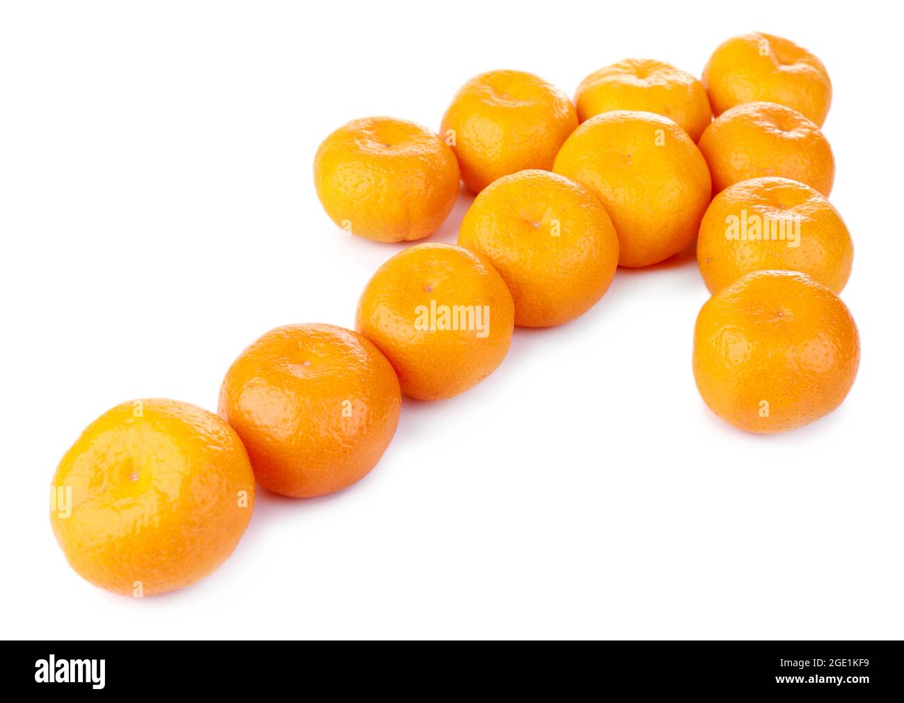 Tangerines in shapw of arrow isolated on white Stock Photo Alamy