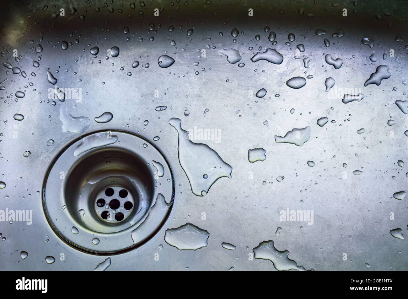 a wet dirty sink after washing many dishes Stock Photo Alamy